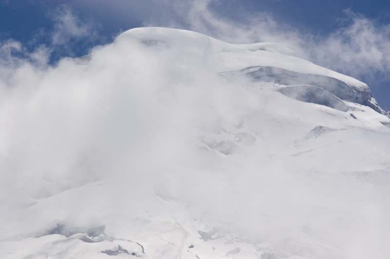 Summit Of Cotopaxi Shrouded In Clouds